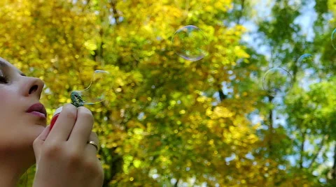 Blowing Soap Bubbles In Slow Motion Stock-Footage 56537850