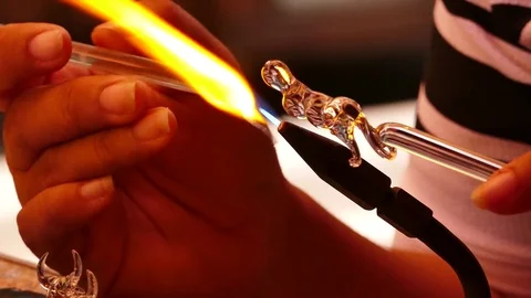 Blown glass by fire to create a dog. Stock Footage 75078520