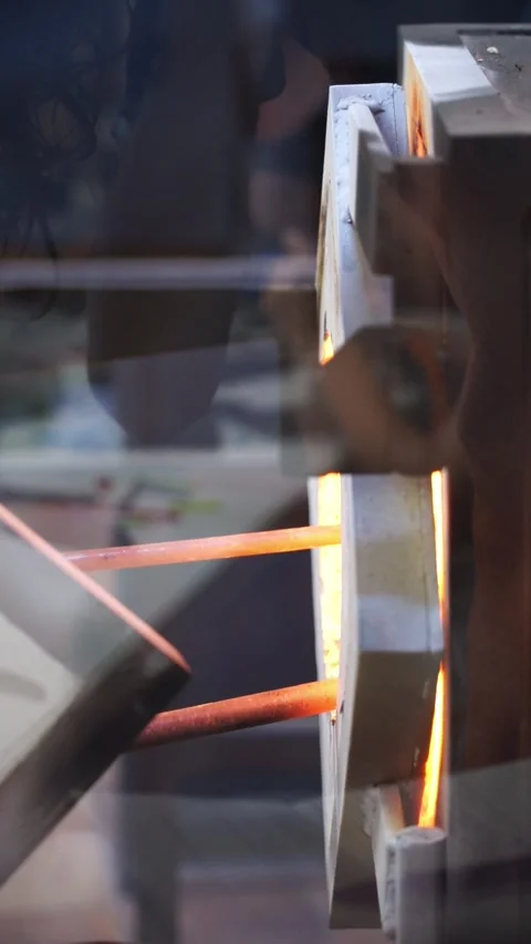 Blown glass heating oven in an artisan glass workshop Stock Footage 277410109