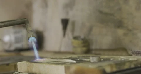 Blowtorch Blue flame on table object Stock Footage 141362884