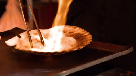 Blowtorch Searing Fresh Scallops in Shell at Tsukiji Fish Market Stock Footage 335738913