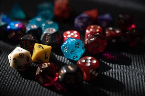 Blue 20-sided Dice at Center of Game Stock Photos