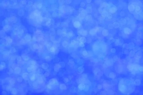 Blue abstract background with circle shaped bokeh. Stock Illustration