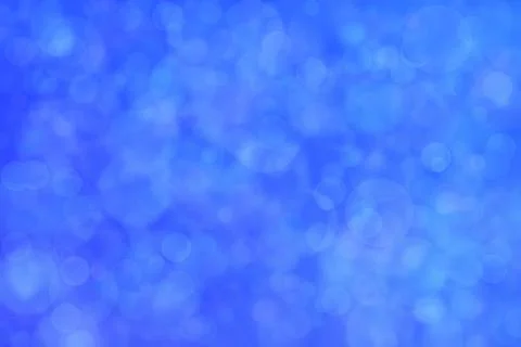 Blue abstract background with circle shaped bokeh. 库存照片