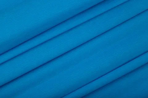 Blue abstract background with diagonal stripes. Flat lay, copy space Stock Photos