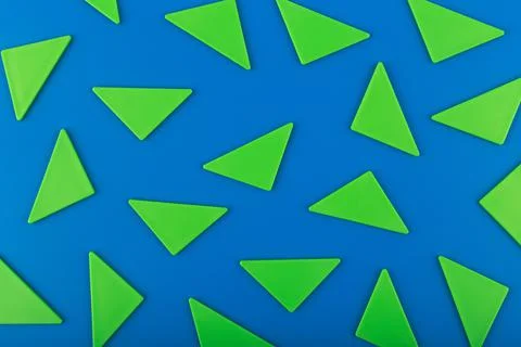Blue abstract background with green triangles 스톡 사진