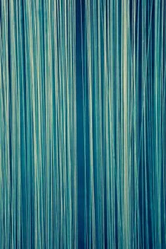 Blue abstract background made of vertical lines Stock Photos