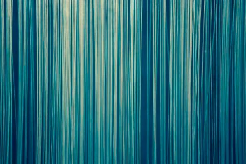 Blue abstract background made of vertical lines Stock Photos