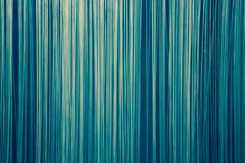 Blue abstract background made of vertical lines Foto stock