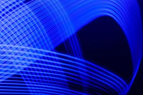 Blue abstract background of neon lines. Stock Illustration