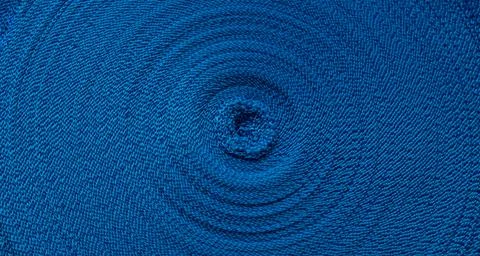 Blue abstract circular pattern of blue sling Stockfoto's