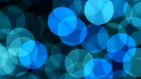 Blue abstract defocused background, circle shape bokeh spots. Loop. Stock Footage 259949479