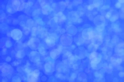 Blue abstract defocused background, circle shape bokeh pattern. イラスト素材
