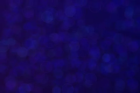 Blue abstract defocused background with circle shape bokeh spots 库存照片