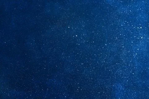 Blue abstract gradient background with white splashes, starry sky 库存照片