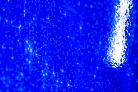 Blue Abstract Light Texture with Glowing Particles Stock Photos