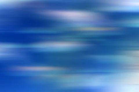 Blue abstract motion blurred background. Light pale blue surface Stock Photos