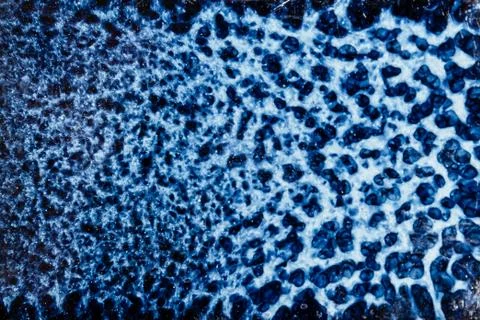 Blue abstract pattern on surface of ceramic dishes that is similar on leopard 스톡 사진
