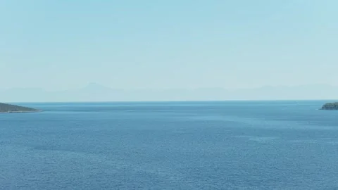 The blue Aegean Sea with distant mountainous horizon, as seen from Alonnisos Stock Footage 346693242