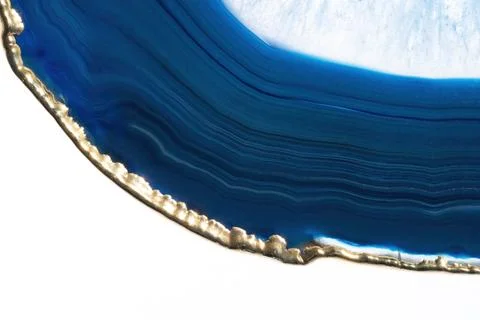 Blue agate cut cross section with gold edge Stock Photos