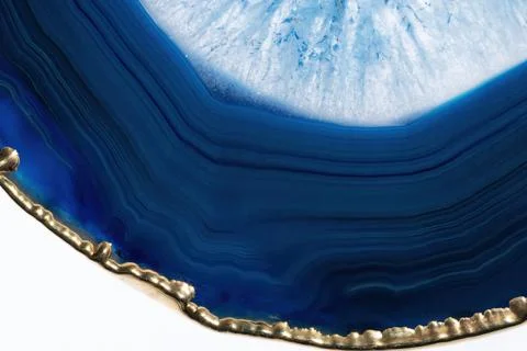 Blue agate cut cross section with gold edge Stock Photos