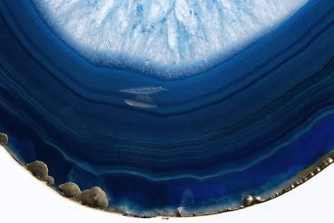 Blue agate cut cross section with gold edge Stock Photos