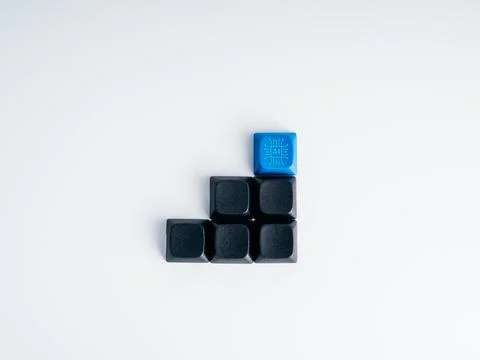 Blue AI block rises above dark technology blocks as staircase. Enterprise m.. Stock Photos