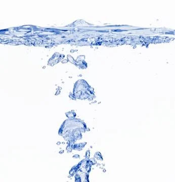 Blue air bubbles floating under water surface Stock Photos