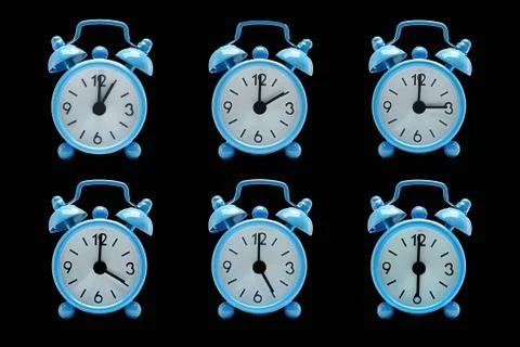 The blue alarm clock Stock Photos