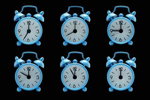 The blue alarm clock Stock Photos