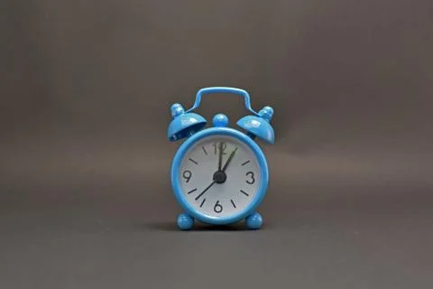 Blue alarm clock Stock Photos