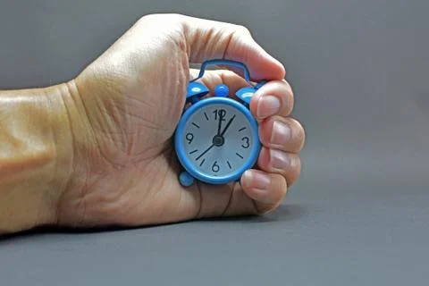 Blue alarm clock Stock Photos