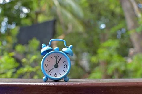Blue alarm clock Stock Photos