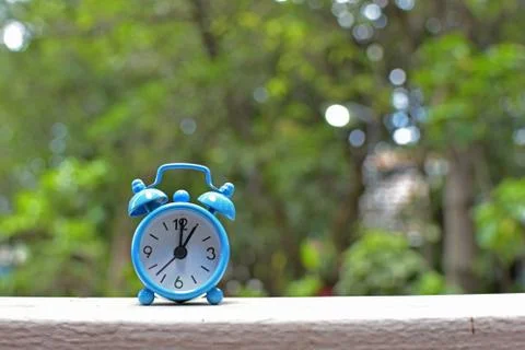 Blue alarm clock Stock Photos