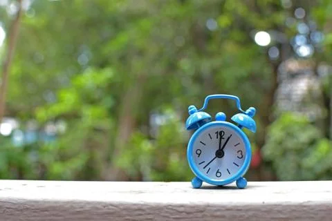 Blue alarm clock Stock Photos