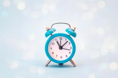 Blue alarm clock. Stock Photos