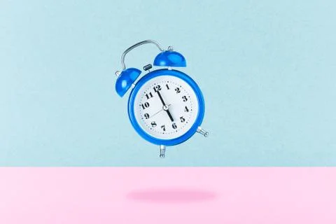 Blue alarm clock Stock Photos