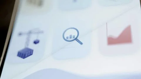 Blue analytics magnifier containing rising bars Stock Photos