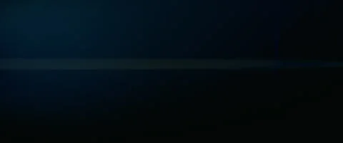 Blue anamorphic abstract lens flare with horizontal light leaks Stock Footage 337745797
