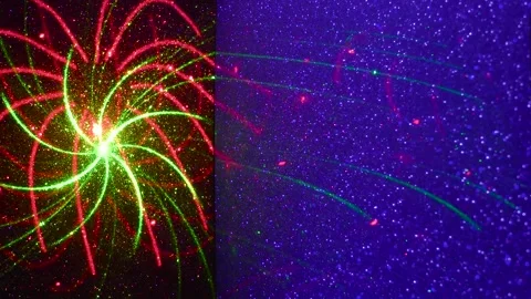 On a blue and black gradient background, moving multi-colored figures Stock Footage 241306226