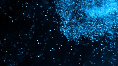Blue and black particles floating on a dark nebulous background - full hd Stock Footage 51149585
