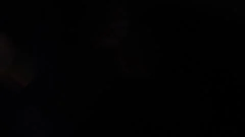 Blue and bronze light flashes in the darkness. 스톡 동영상 318367980