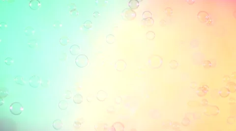Blue and clear soap bubbles on turquoise and pink, background Stock Footage 53020210