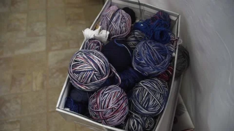 Blue and colorful threads in a box  Stock-Footage 144760547