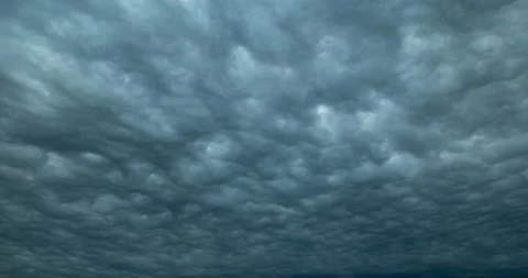 Blue and dark grey heavy clouds in the sky before a thunderstorm. Stock Footage 209135853