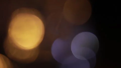 Blue and gold light superimposed in the darkness Video stock 309375527