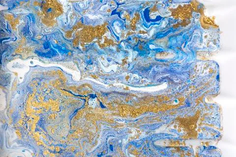 Blue and gold marbling pattern. Golden marble liquid texture. Stock Illustration