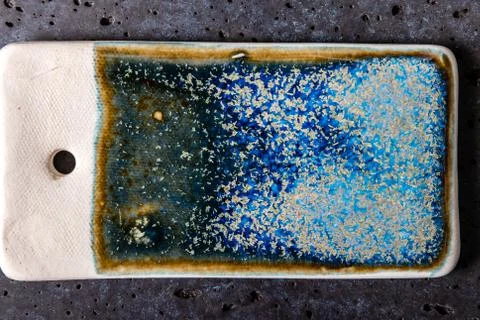 Blue and green abstract pattern on surface of ceramic free sample, art styliz 库存照片