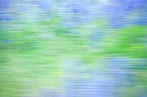 Blue and green speedblur forest landscape Stock Photos