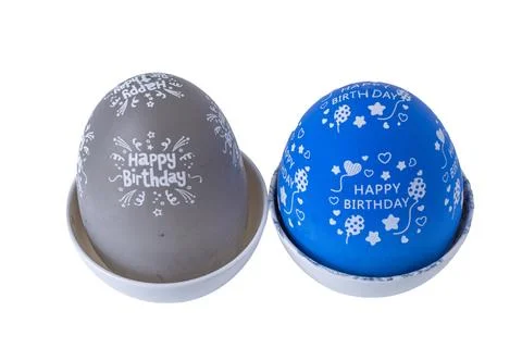 Blue and grey egg shaped kitchen timers isolated on a white background Stock Photos